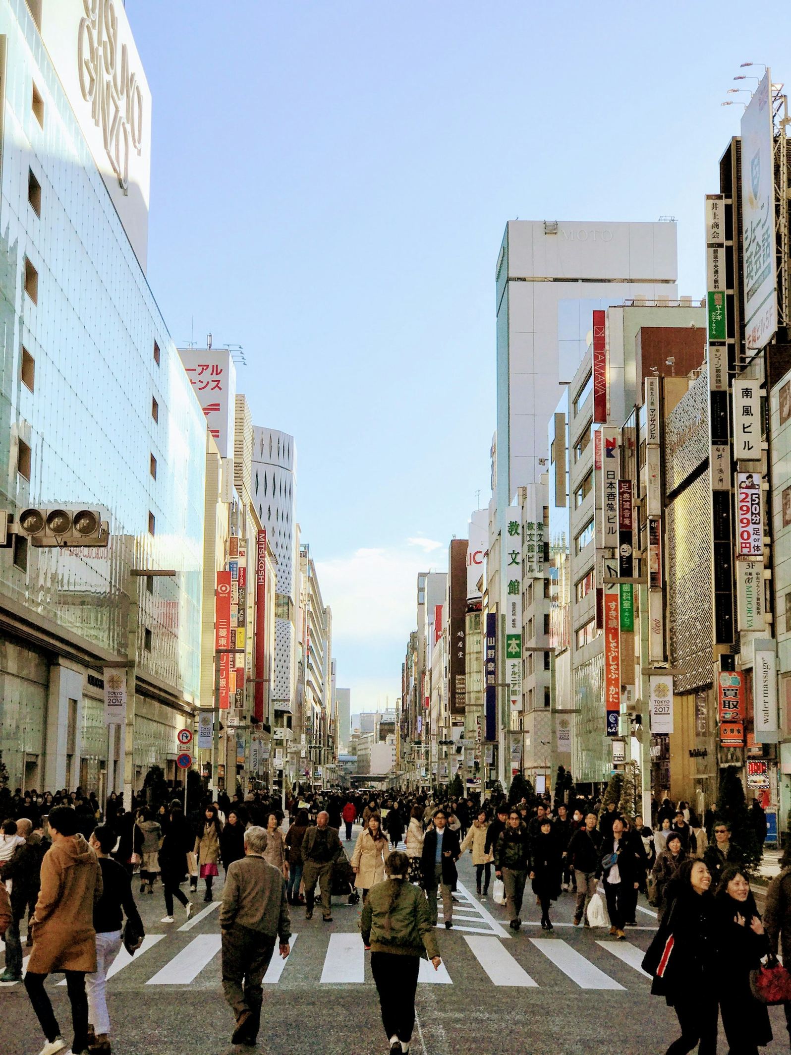 Ginza Chuo-dori main street on a weekend afternoon when it becomes a pedestrian-only promenade