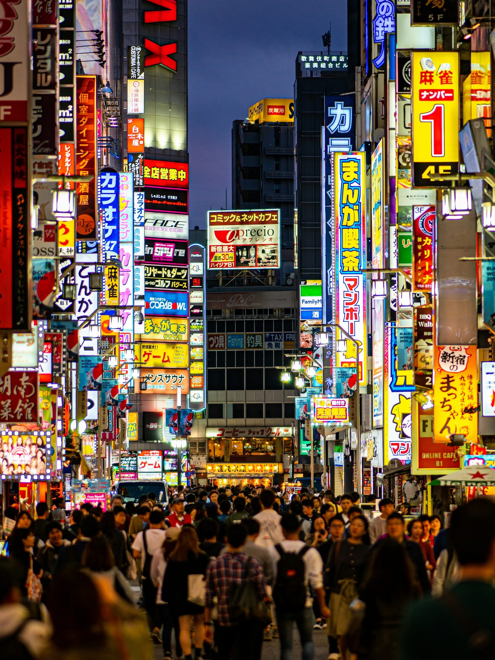 Kabukicho neon streets crowded at night in Shinjuku, Tokyo